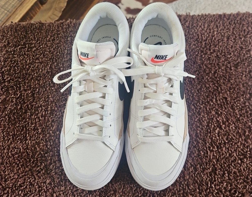Nike White Sneakers with Black Swoosh